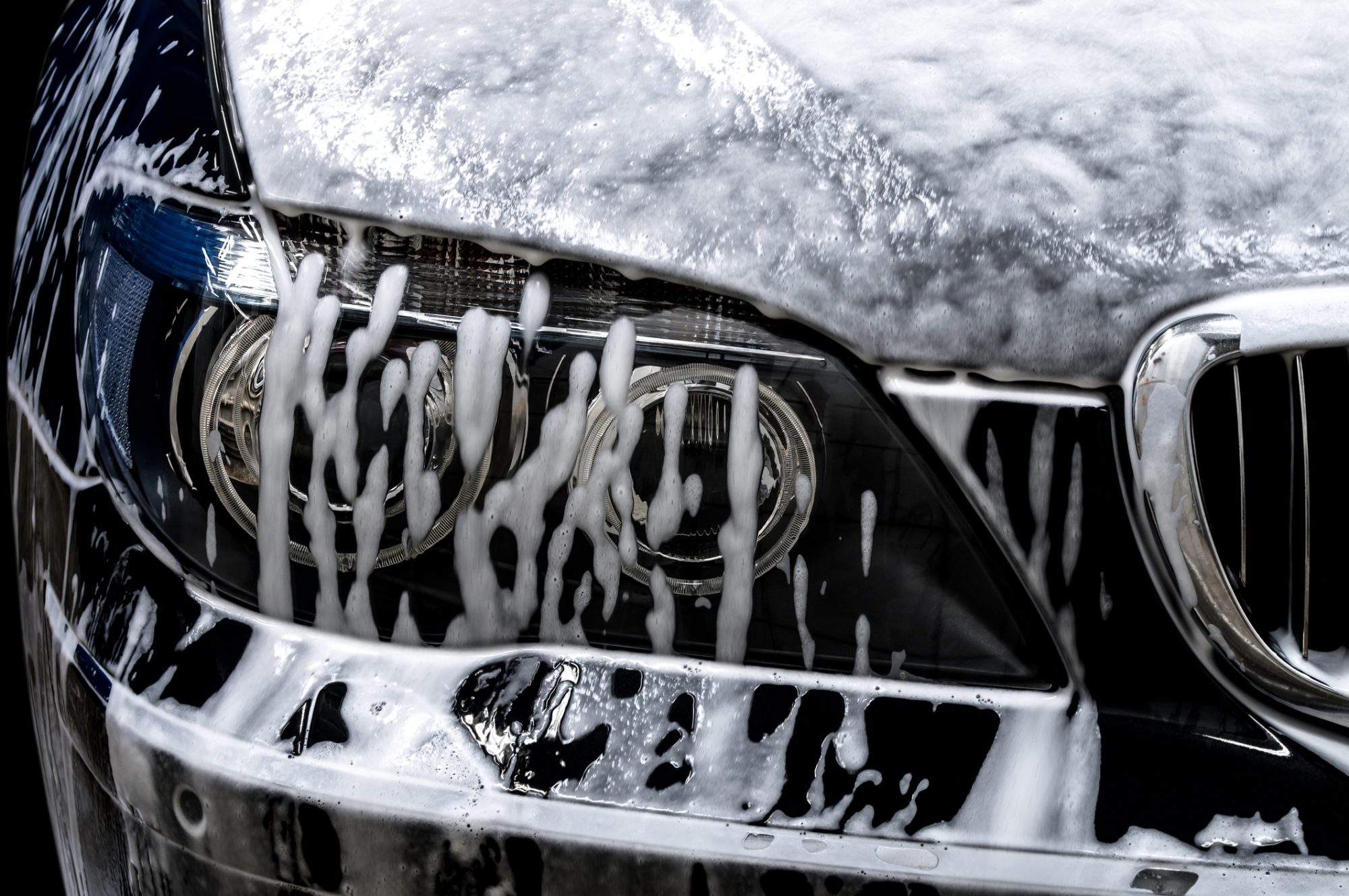 Car wash with soap. Horizontal photo.